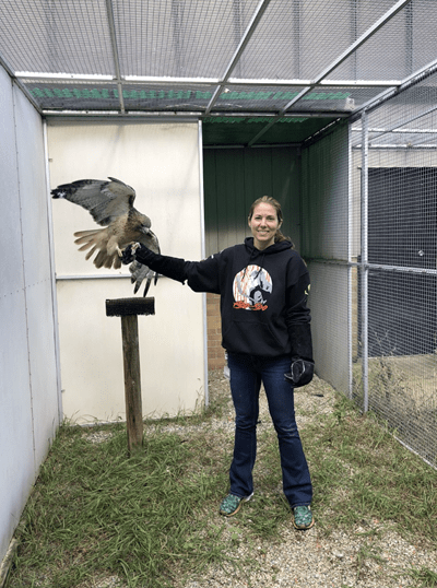 Andrea Weinrick holding bird