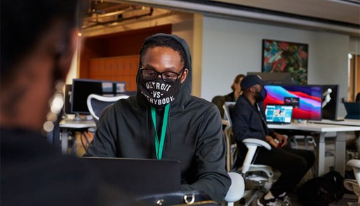 Student at Apple Developer Academy in "Detroit vs. Everybody" mask