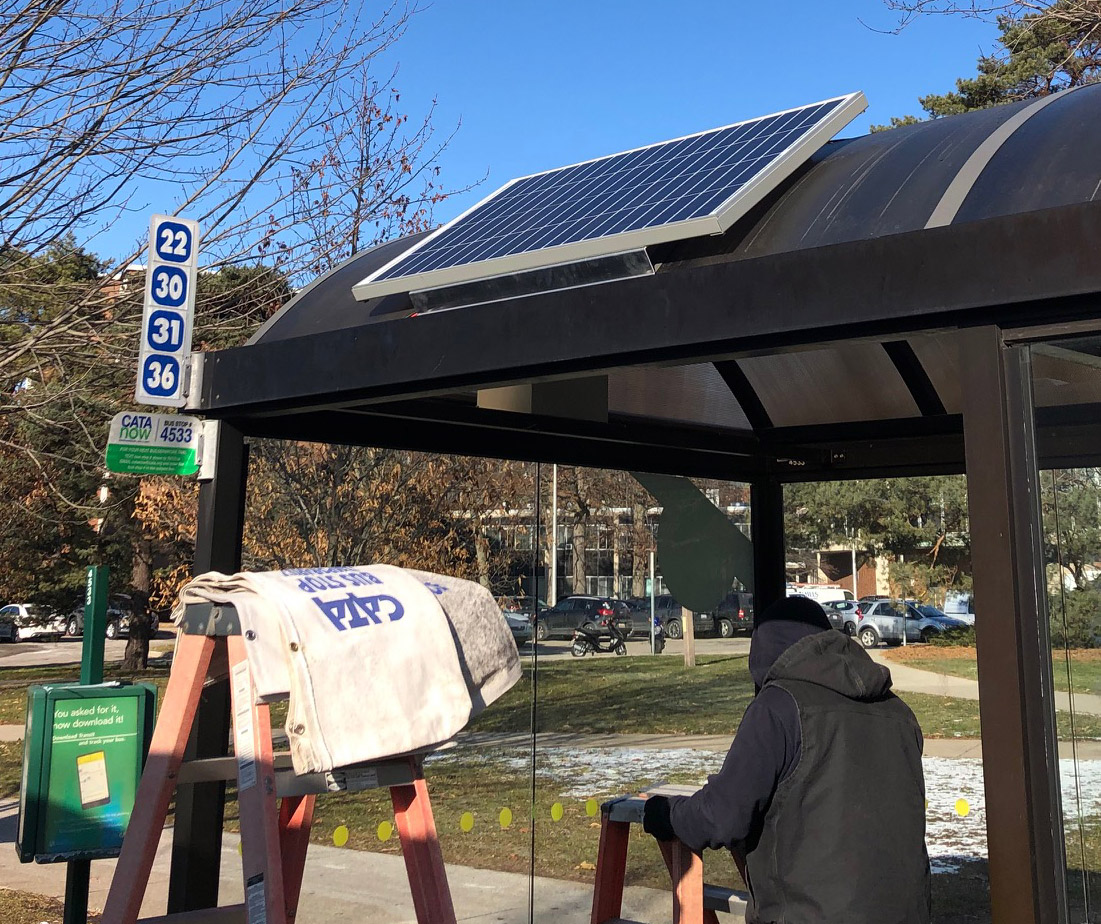 Installing solar panel at CATA bus stop