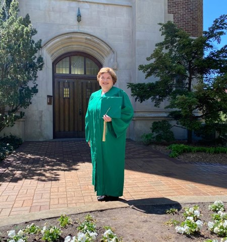 Peggy Kennedy in her graduation gown