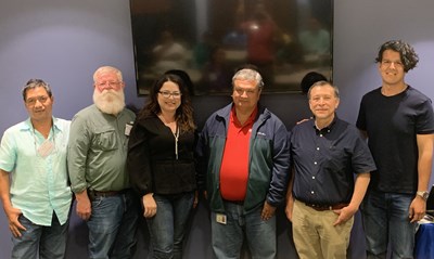 Posos-Parra with seed industry members in Salinas, Puerto Rico.