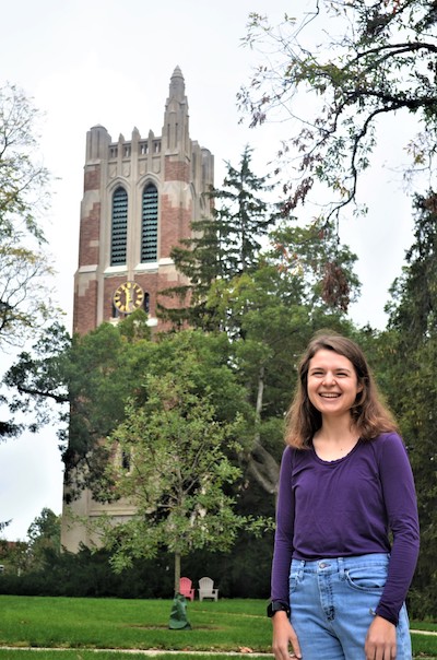 Rachel Drobnak with Beaumont Tower in the background