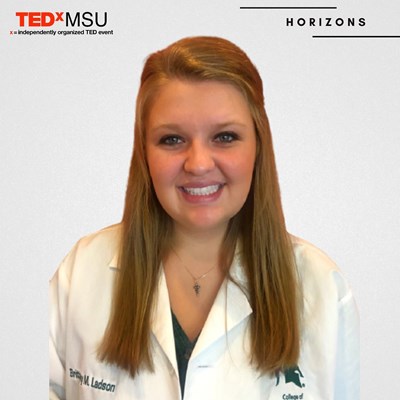 Brittany Ladson under a TedxMSU banner