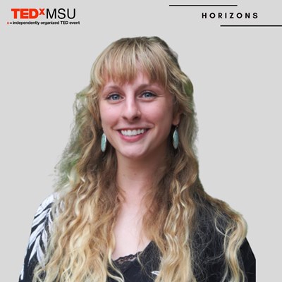 Jessica Crawford under a TedxMSU banner