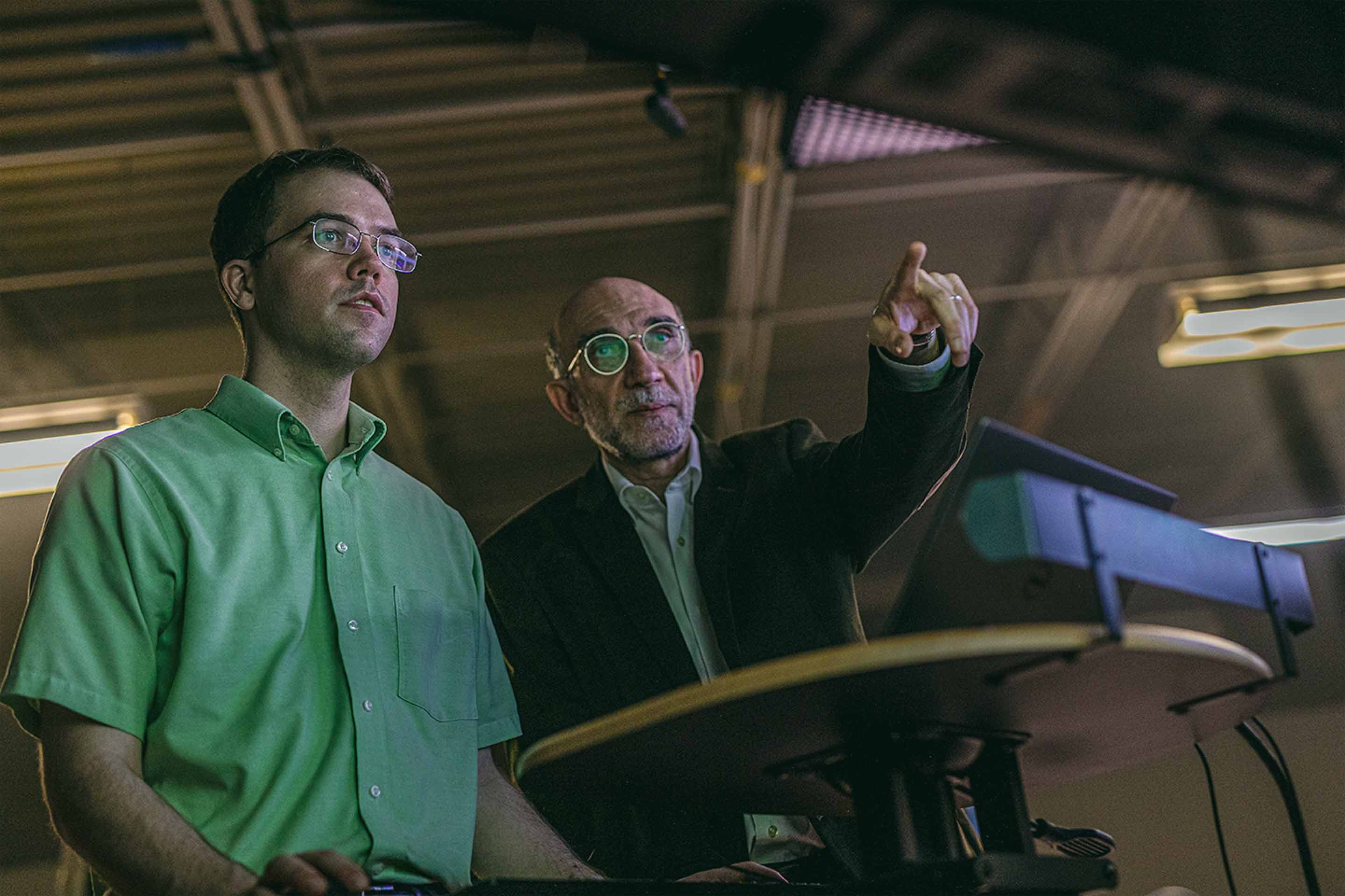 MSU Foundation Professor Hayder Radha (left) and doctoral student Daniel Kent work in the Connected and Autonomous Networked Vehicles for Active Safety, or CANVAS, lab.