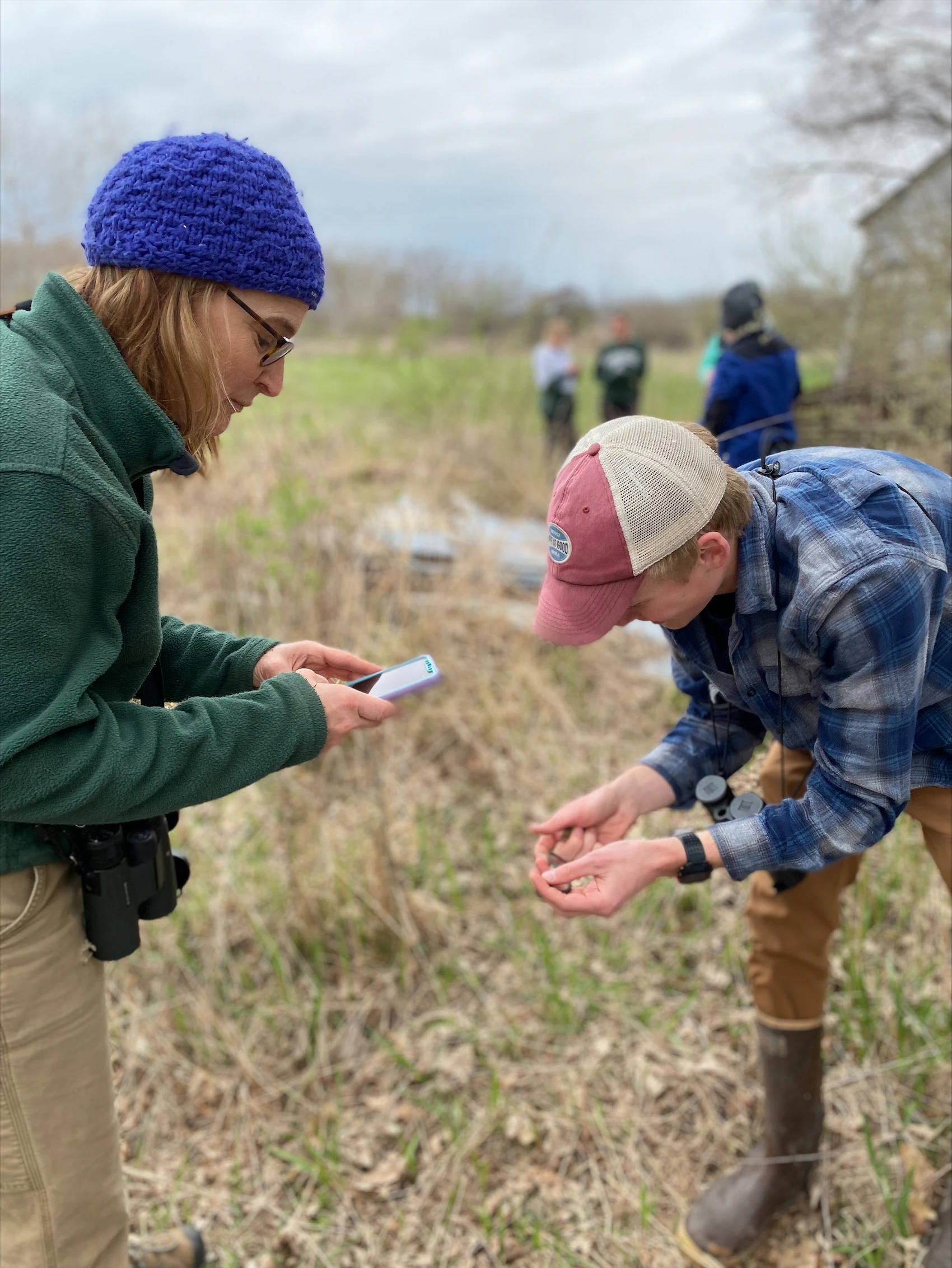 Dr. Jen Owen interacts with a student at the Corey Marsh Ecological Research Center