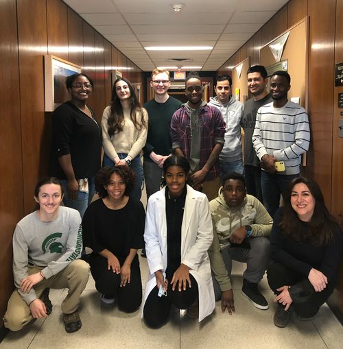 Graduate students from the Green Bioproducts Science and Engineering Lab alongside high school students visiting from Ecotek Lab in Detroit