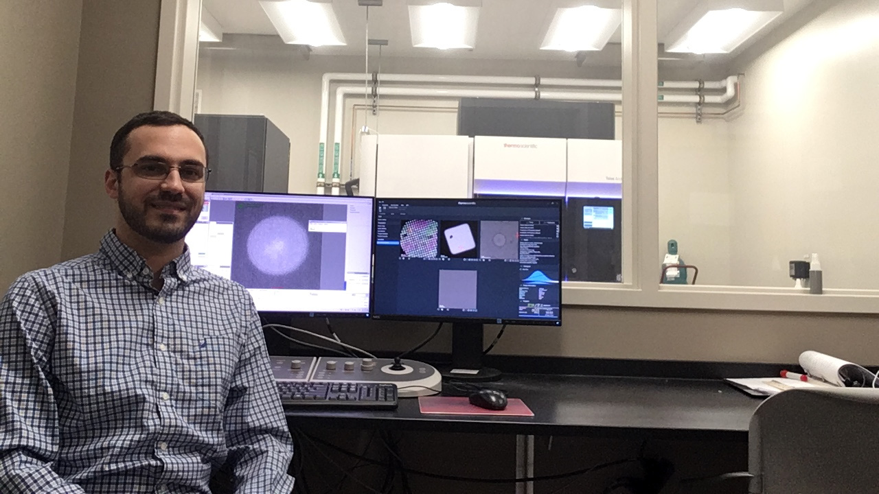 MSU Assistant Professor Ben Orlando sits inside MSU’s Cryo-EM Facility. 