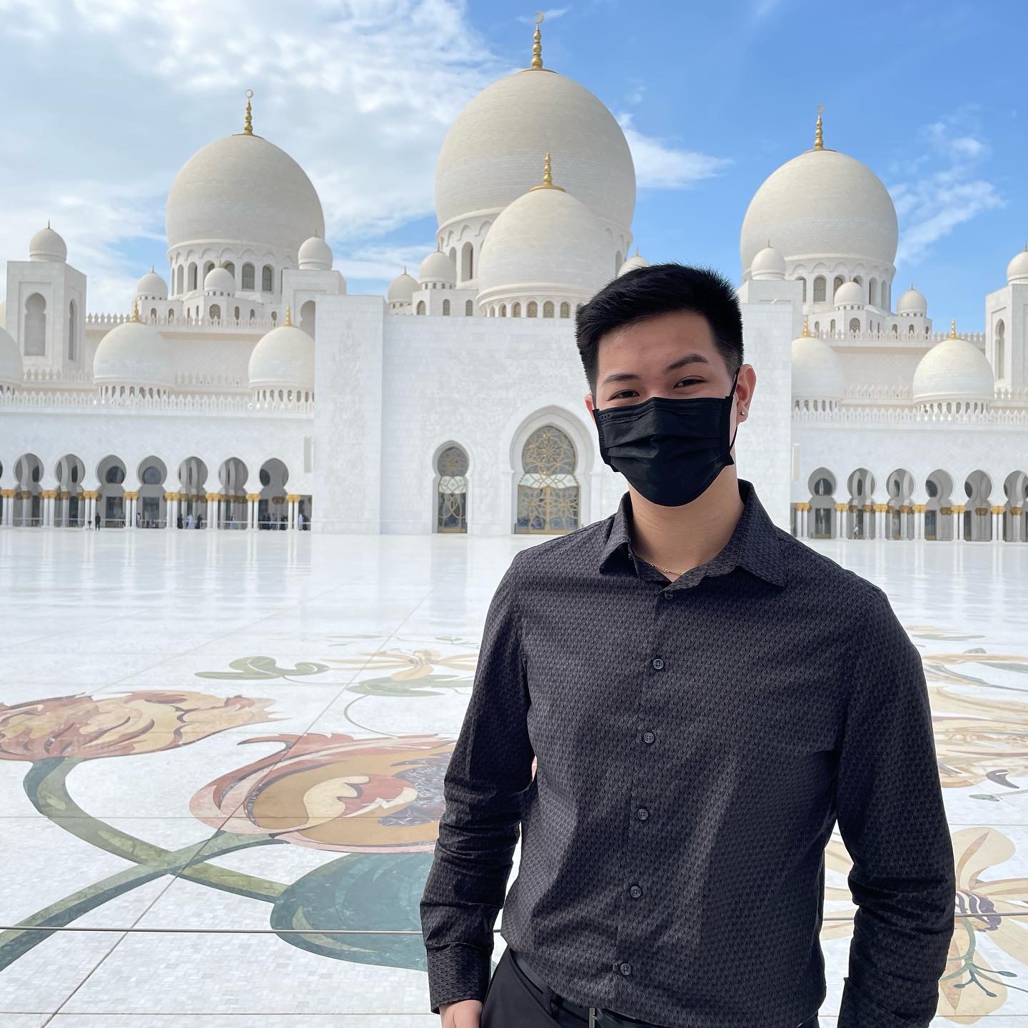 David standing in front of the Grand Mosque in Abu Dhabi.