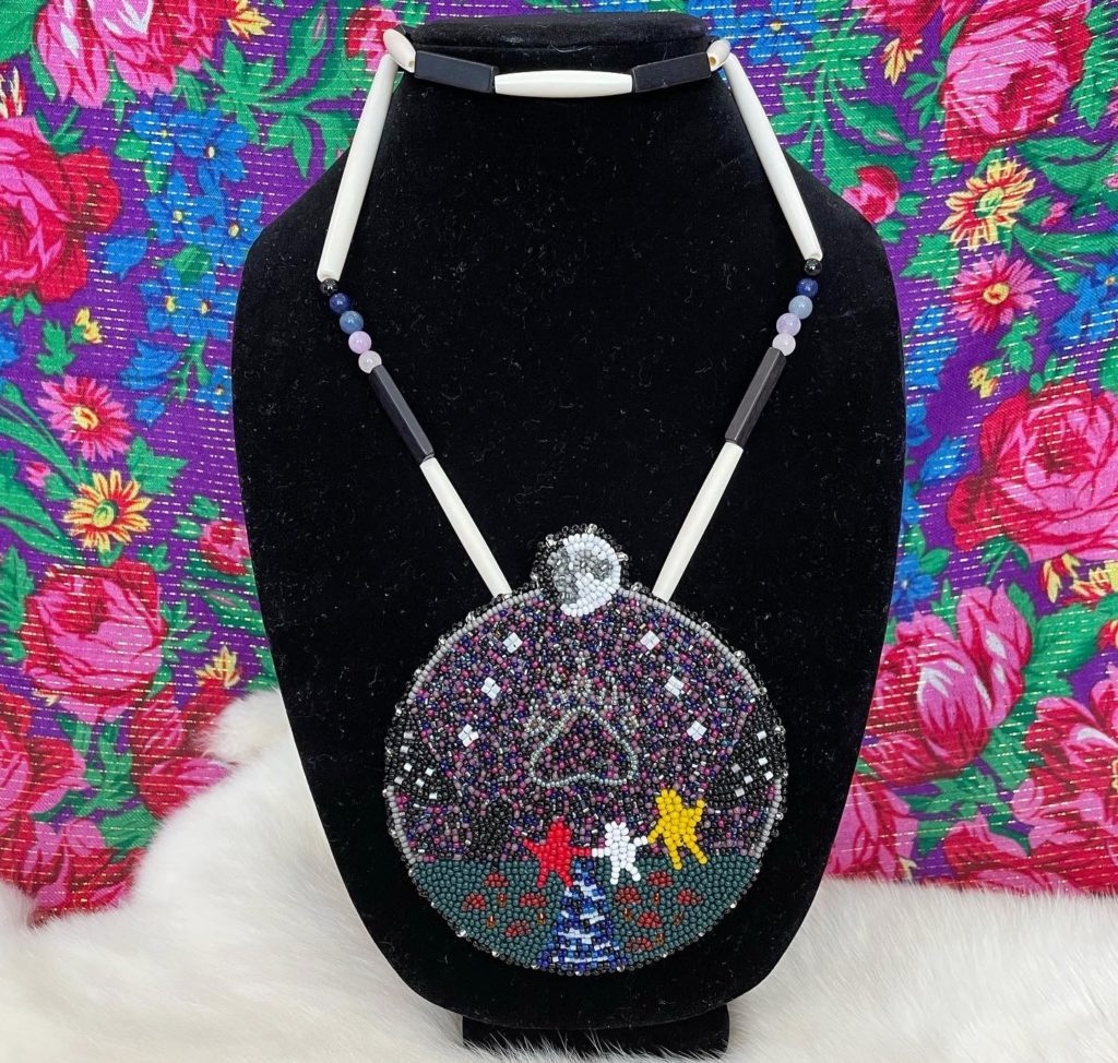 Gaagegiiziigo, Esme Bailey’s finished medallion, designed as a contemporary version of traditional Anishinaabe beadwork