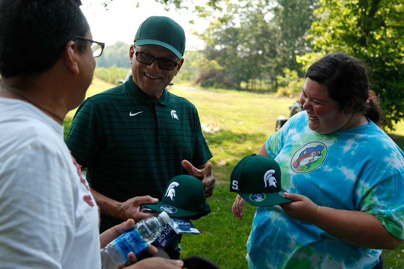 Luis Alonzo Garcia with a family in West Michigan