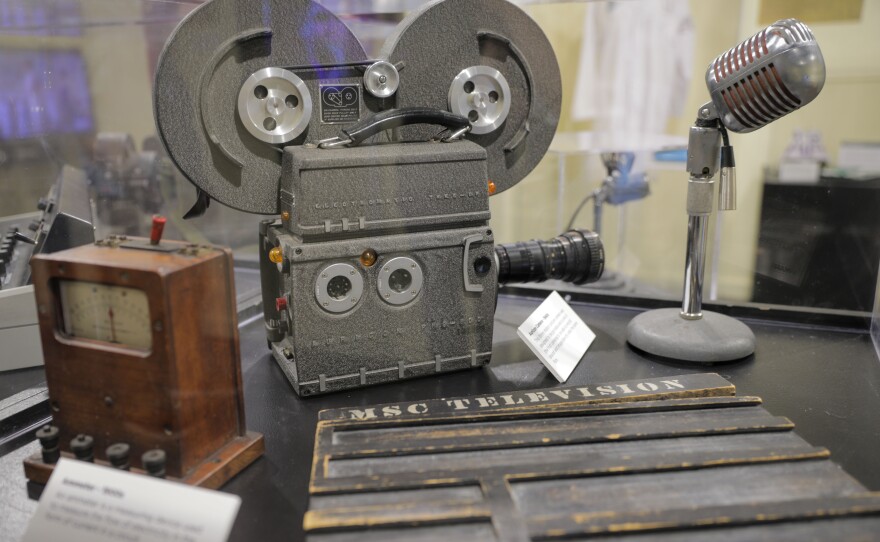 Antique film camera, microphone and radio used by WKAR displayed at the MSU Museum