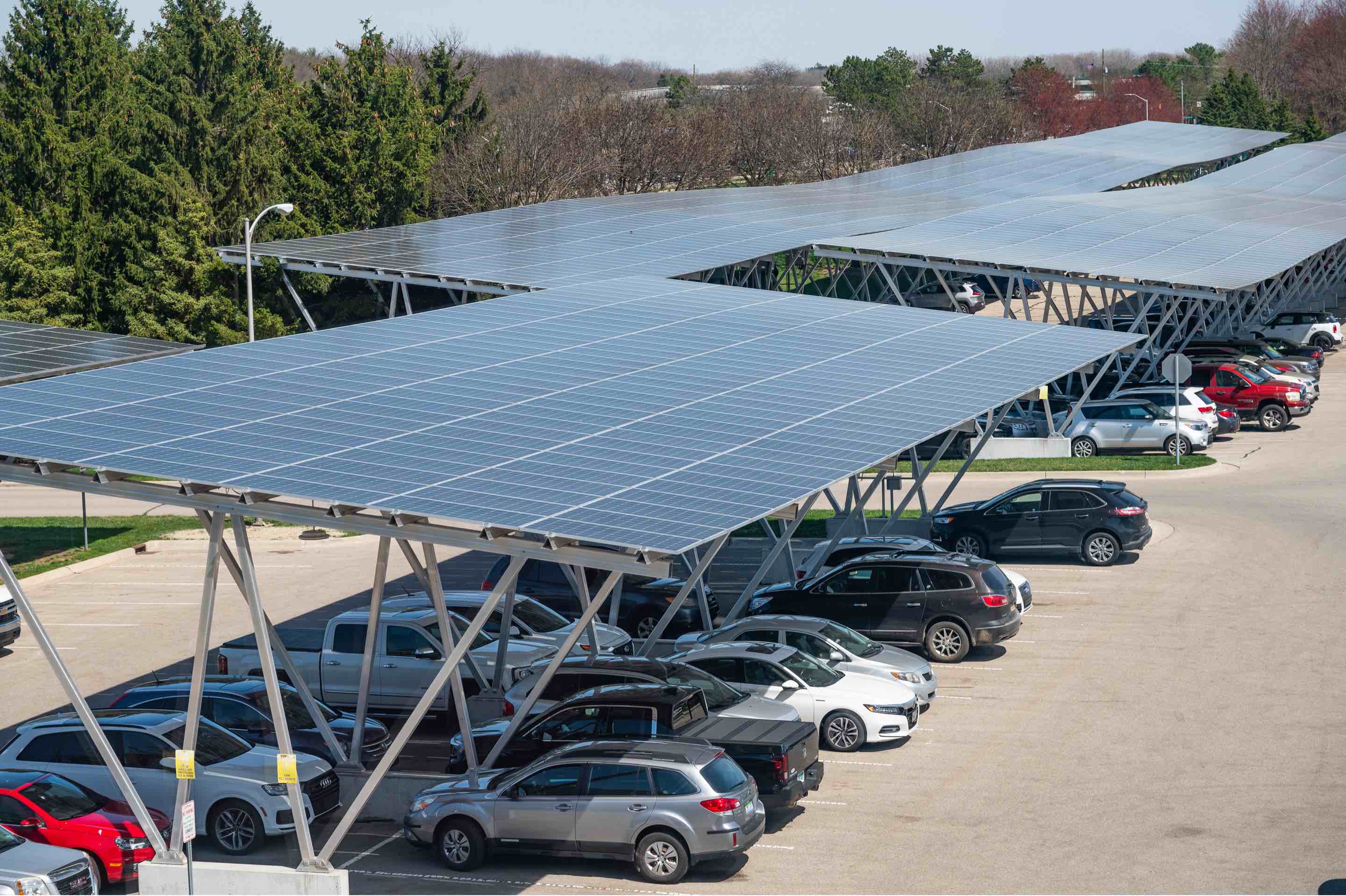 Solar arrays cover parking spaces in a parking lot on MSU’s campus. 
