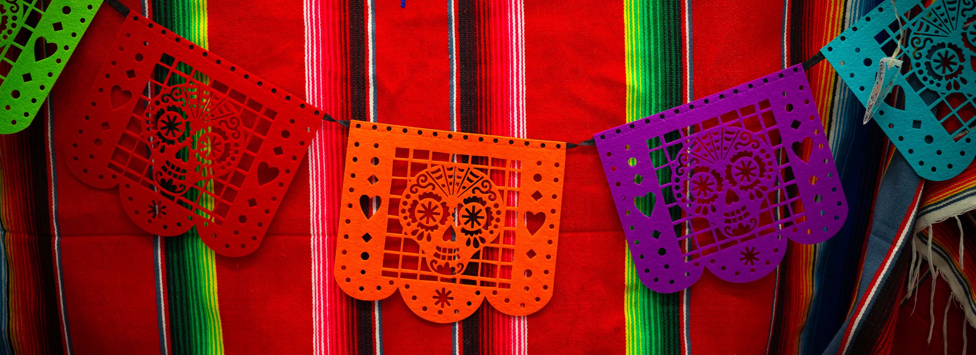 Traditional papel picado, or paper cutouts, used for Day of the Dead celebrations.