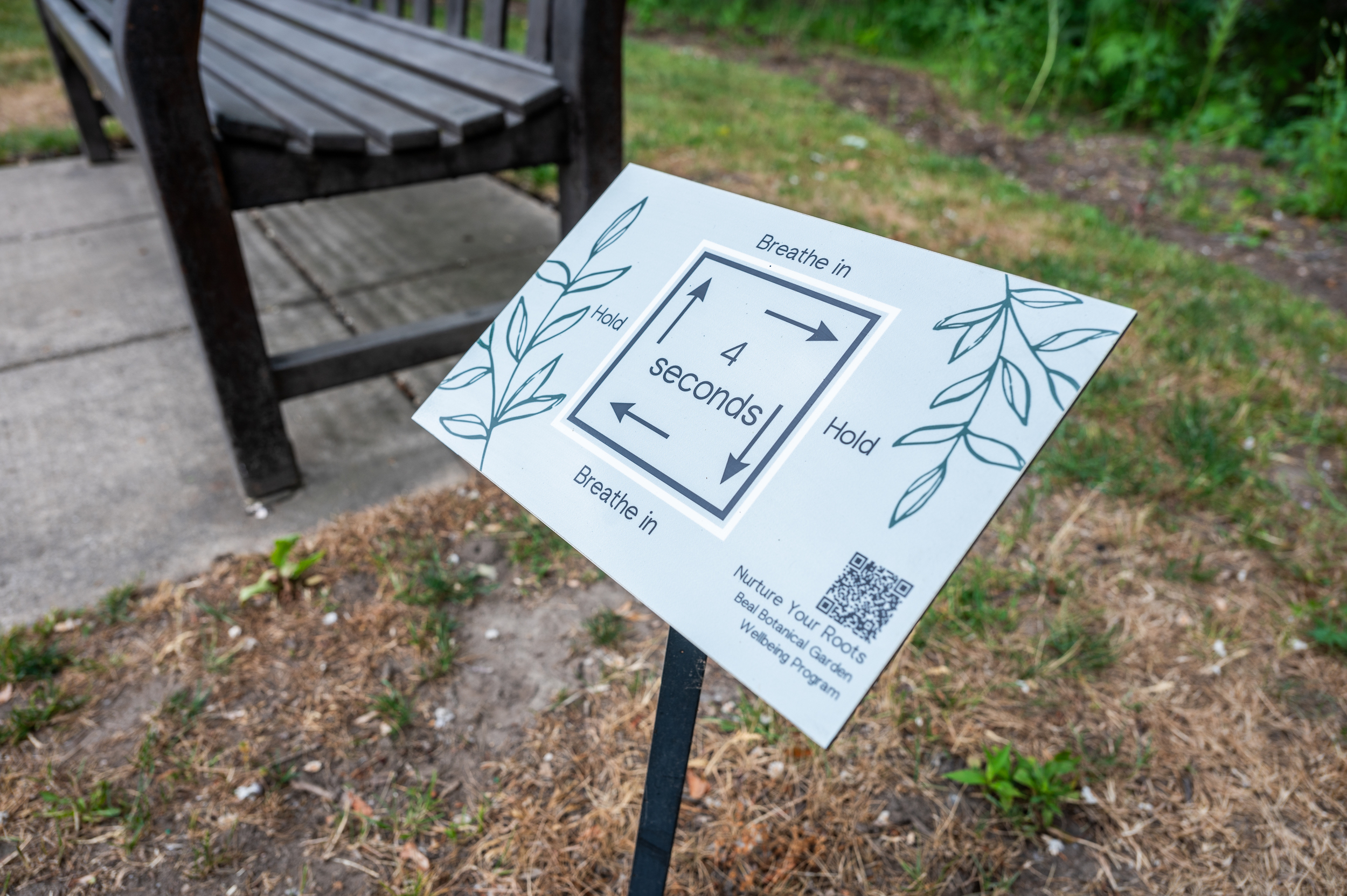 A sign in the Beal Garden that offers a meditation activity.