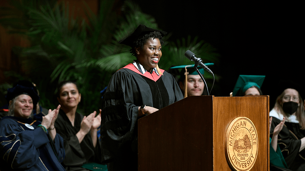 Yvette Efevbera delivers the keynote speech during James Madison College Spring Commencement ceremony on May 6, 2023. Photo by Rod Sanford.