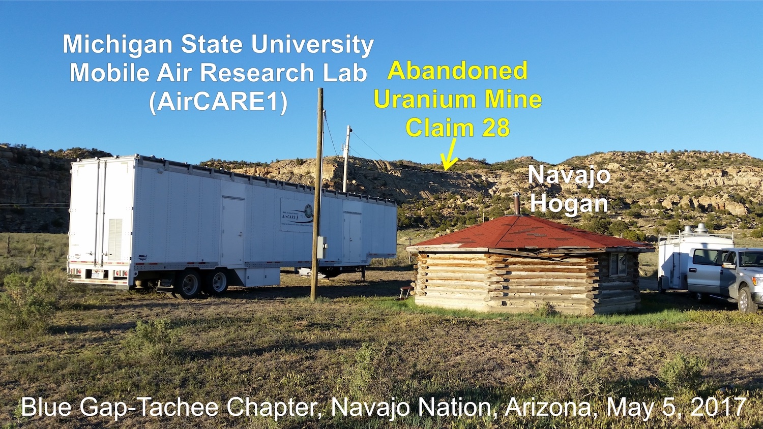 The first mobile air research lab in Arizona in 2017. Captions on photo read; Michigan State University Mobile Air REsearch Lab (AirCARE1), Abandoned Uranium Mine Claim 28 [with an arrow pointing to a place in the mountains], and Navajo Hogain