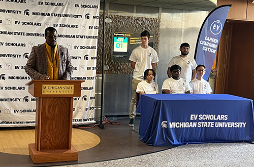 MEDC President and CEO Quentin Messer Jr. with five of MSU's new EV Scholars.