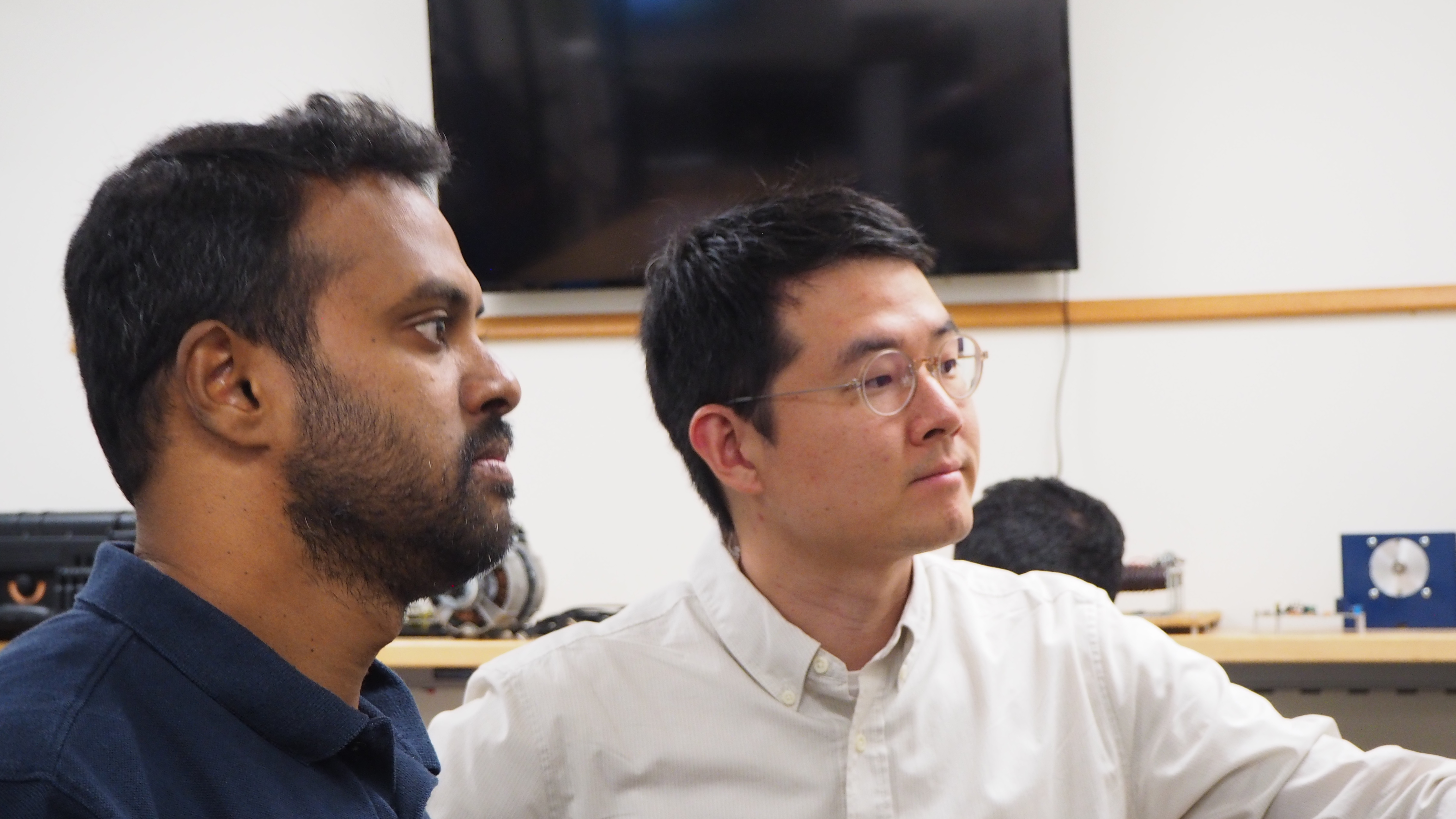 Assistant Professor Woongkul “Matt” Lee works with graduate student Avinash Dornala (left).