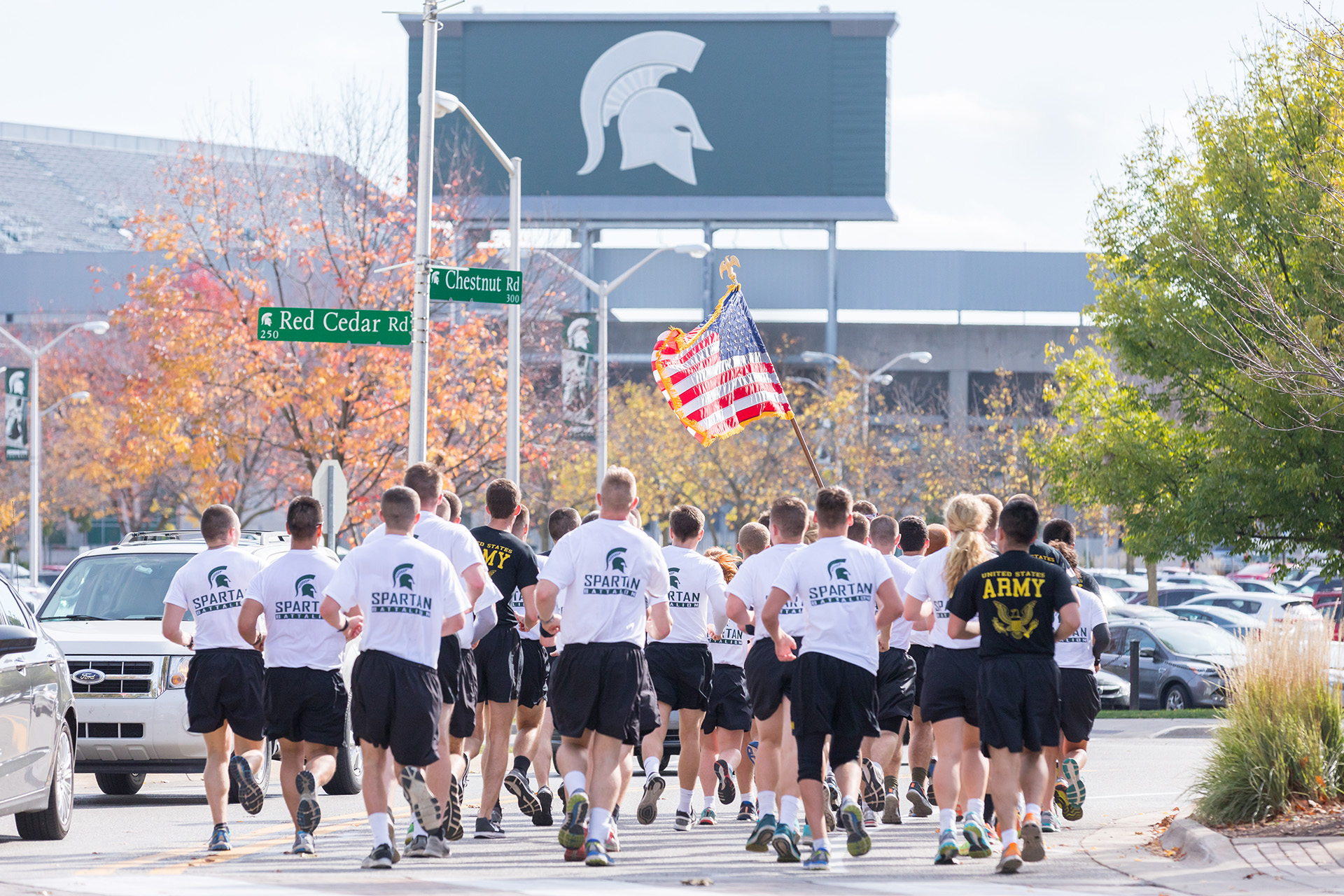 ROTC cadets from MSU and UM run in front of Spartan Stadium as part of Alex's Great State Race.