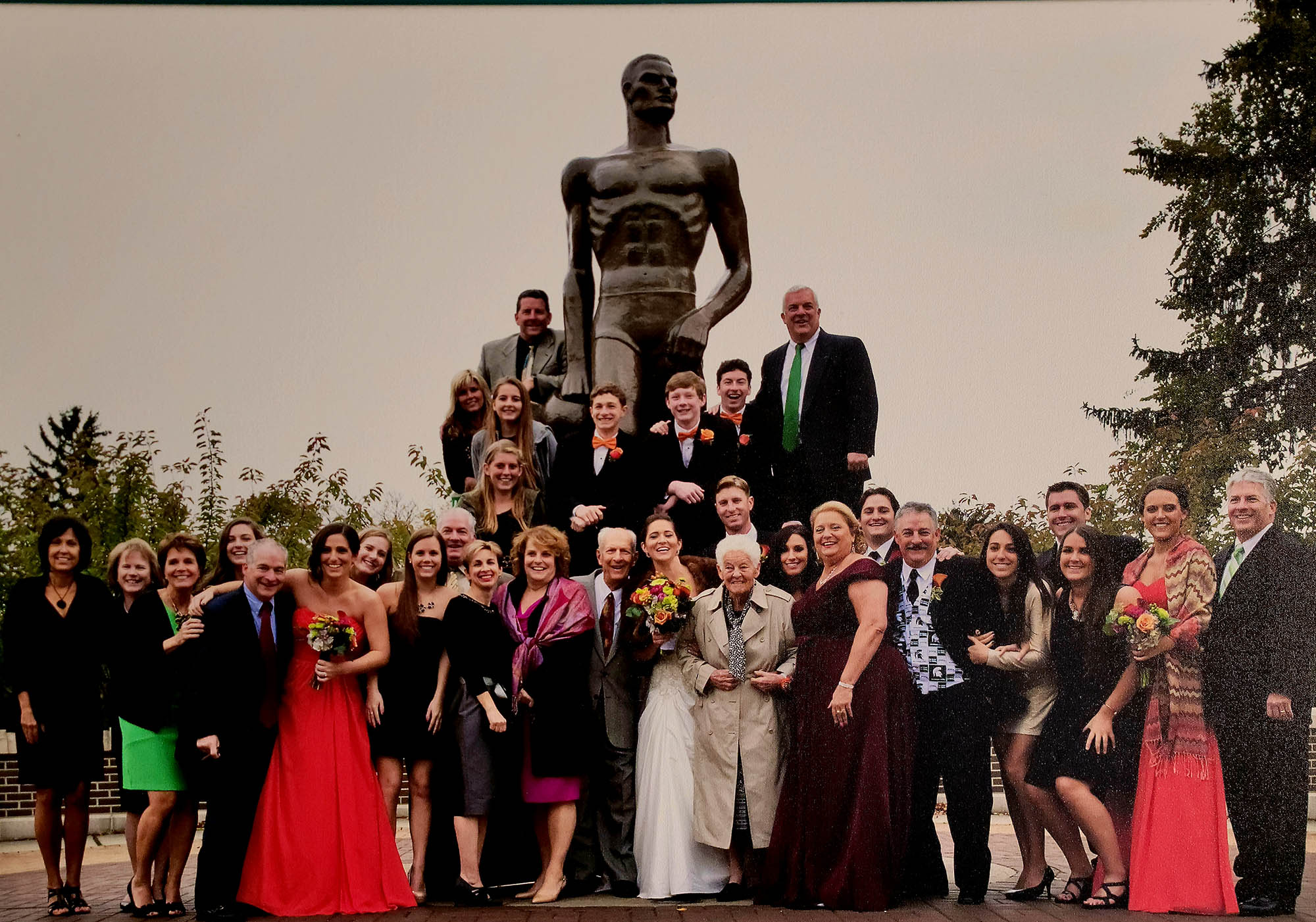 Kerri Cash and wedding party in front of Spartan statue