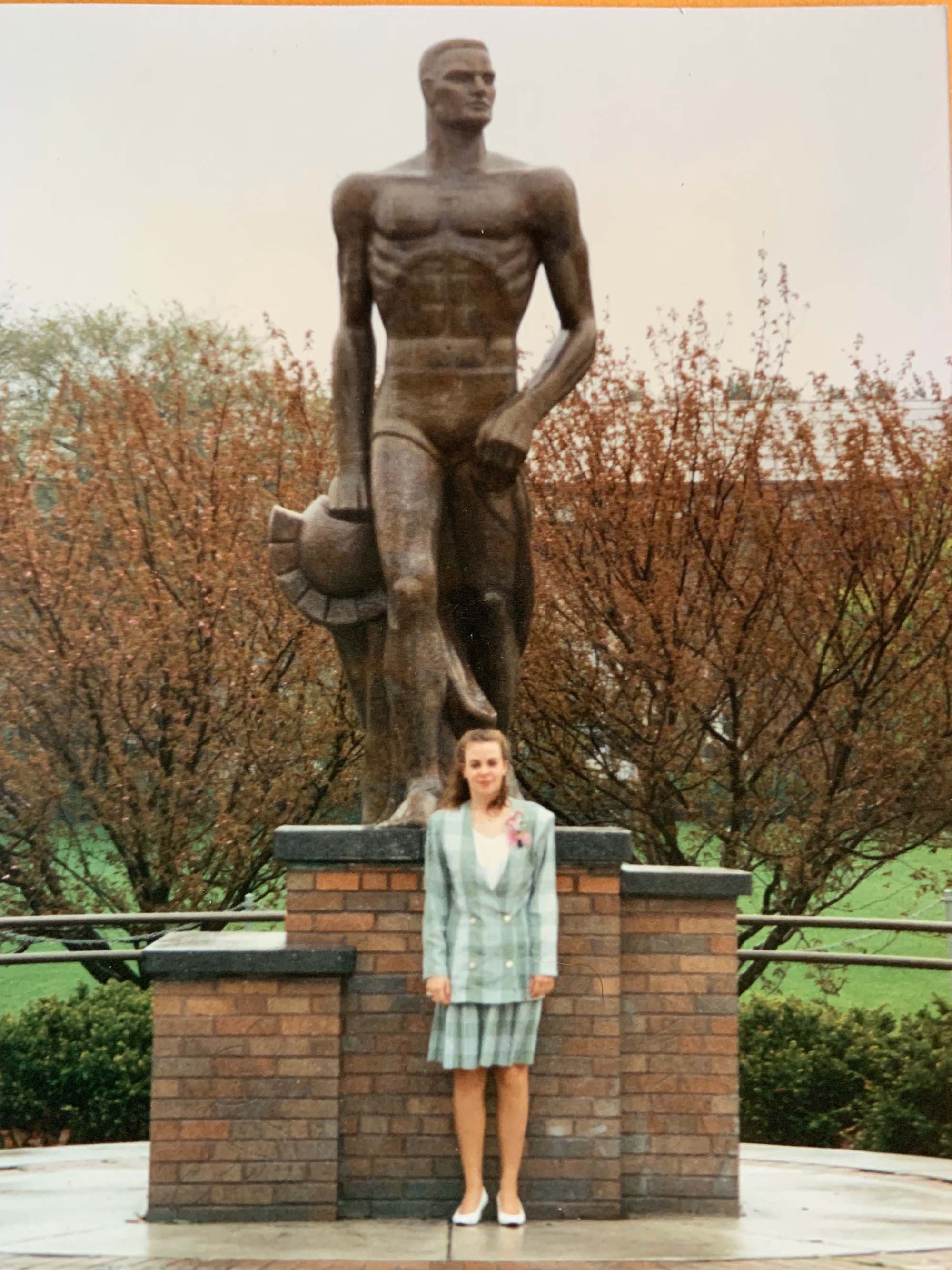 Vintage photo of Jennifer Somerlott in front of Spartan Statue