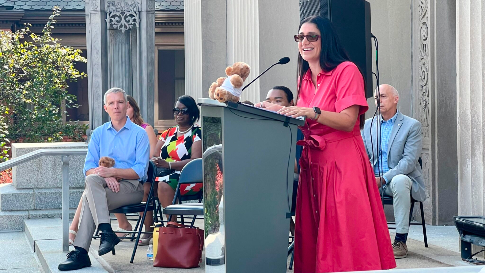 Dr. Mona Hanna-Attisha speaks from podium. 