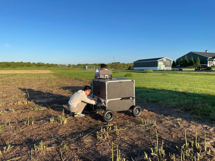 Yuzhen Lu's team conducting field imaging