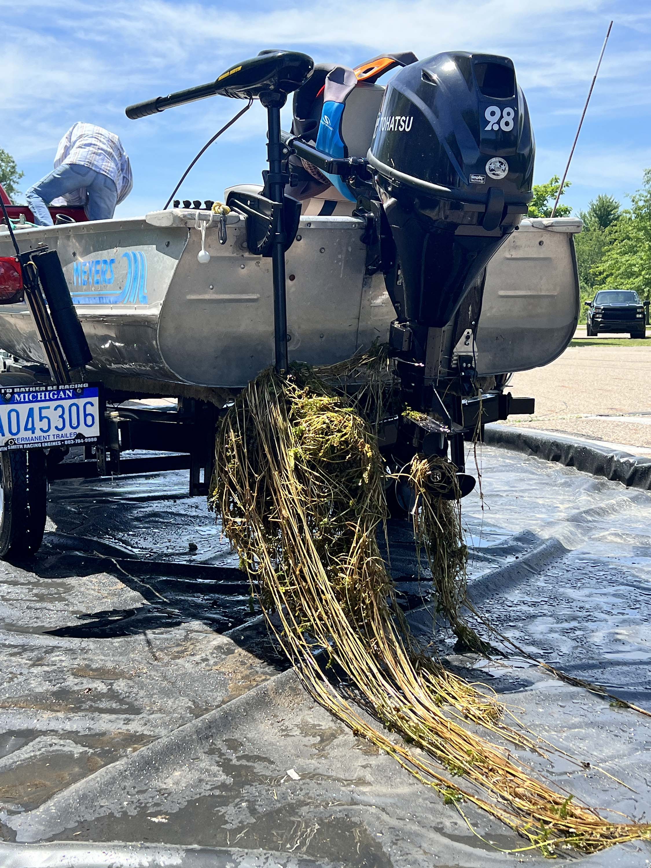 Aquatic plants stuck to boat propeller