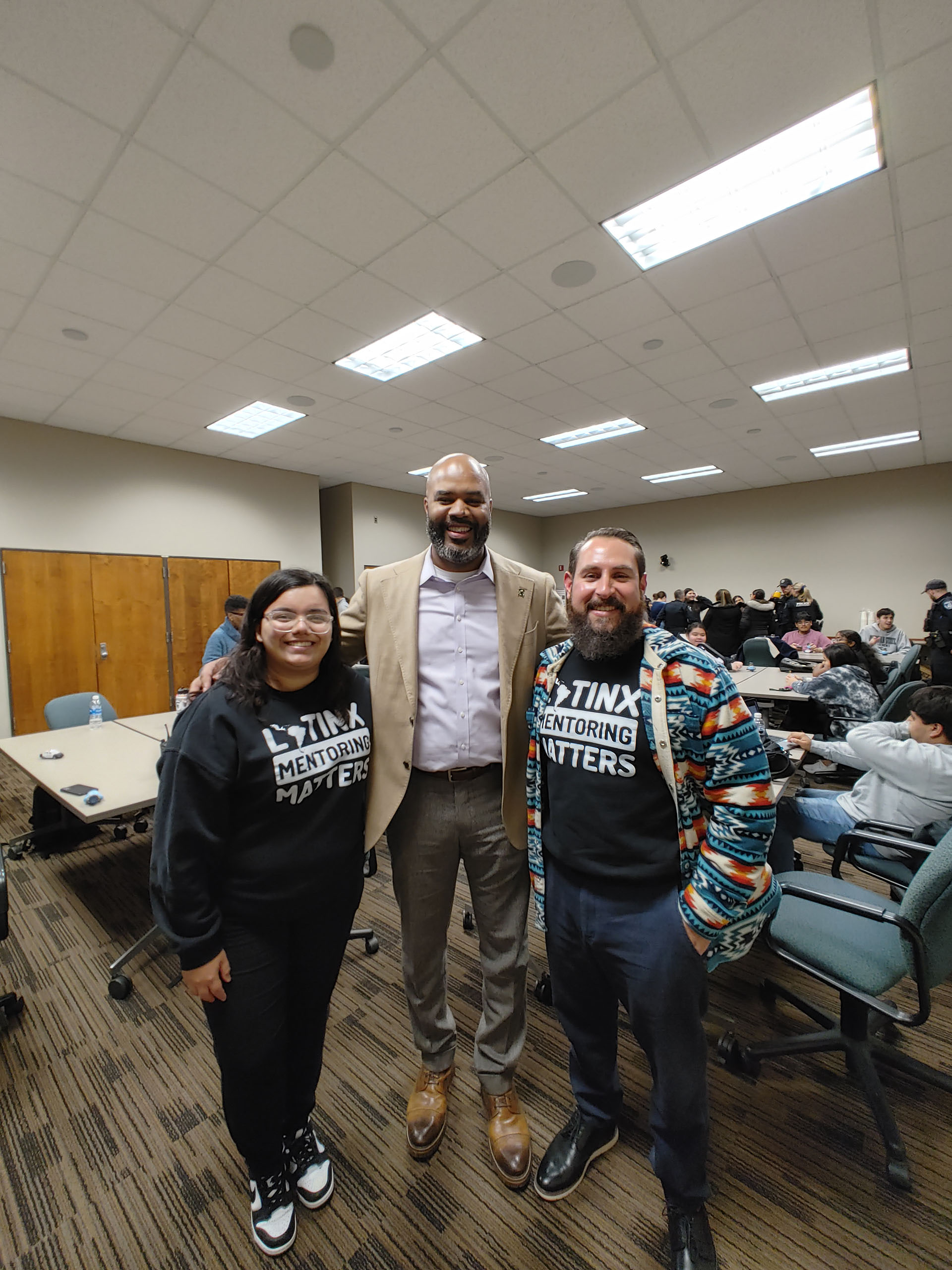 Leeslie Herrera, Marlon Lynch and Elias Lopez pose for a photo