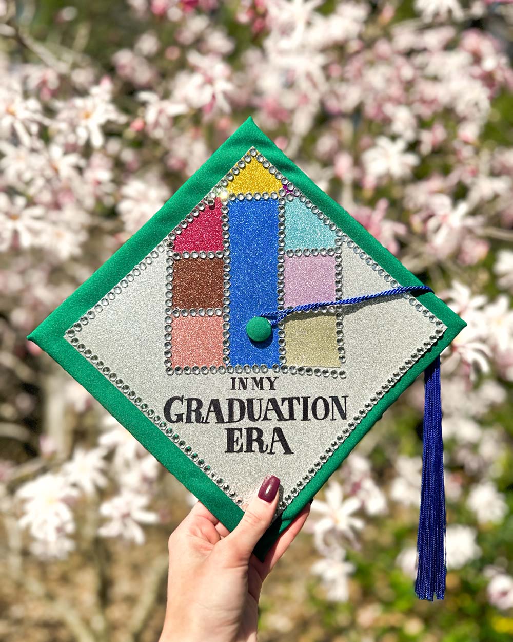 Eras-tour themed graduation cap with text in my graduation era