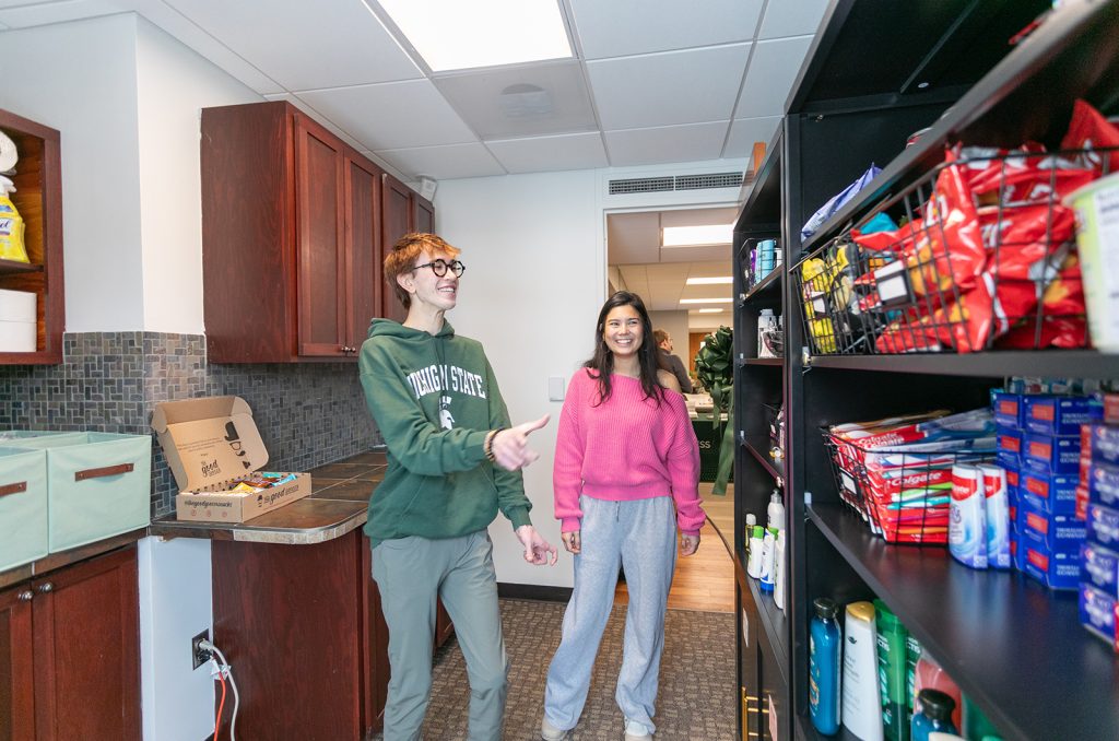 students organizing food and products