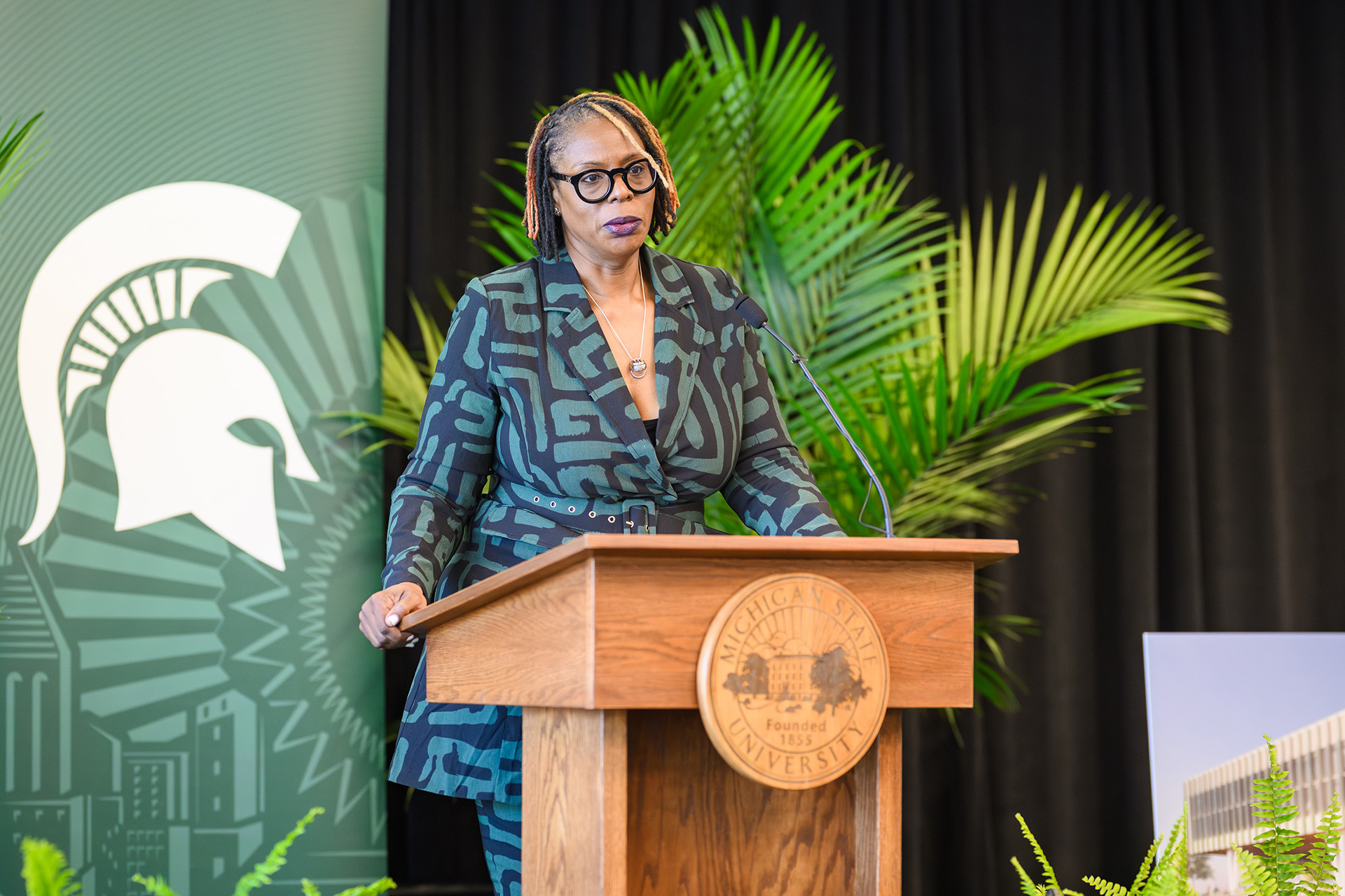 Genyne Royal speaking at the lectern