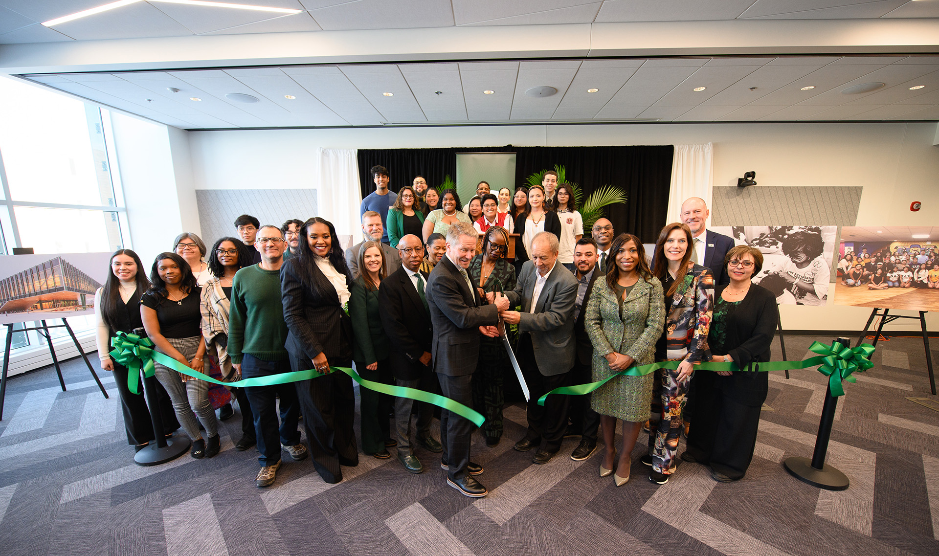 large group cuts the ribbon