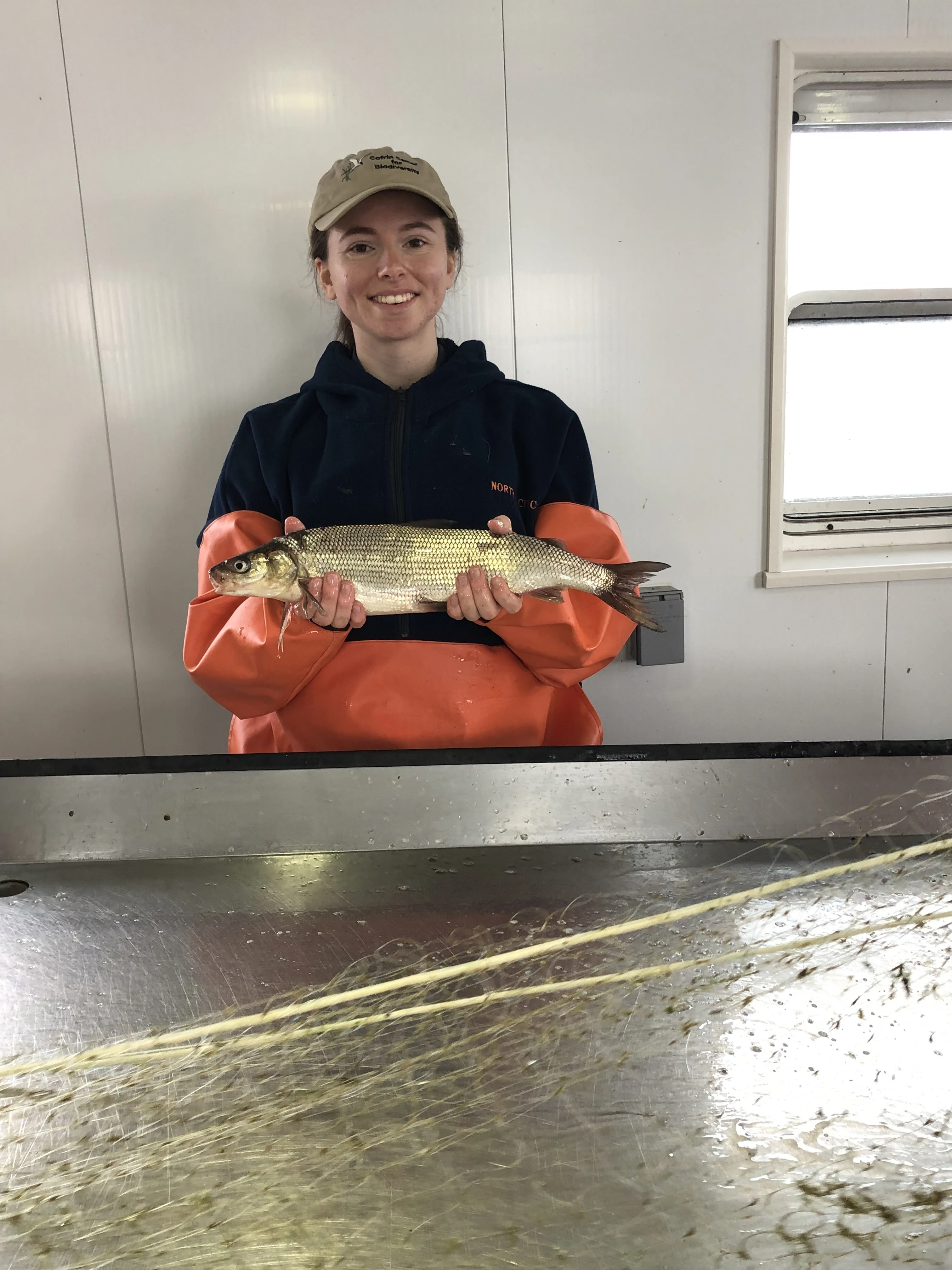 Alicia Krause holds a lake whitefish