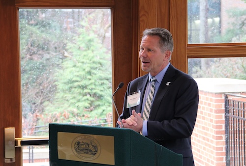  President Kevin Guskiewicz speaks at the March 20 Lansing cohort program launch event at Cowles House. 