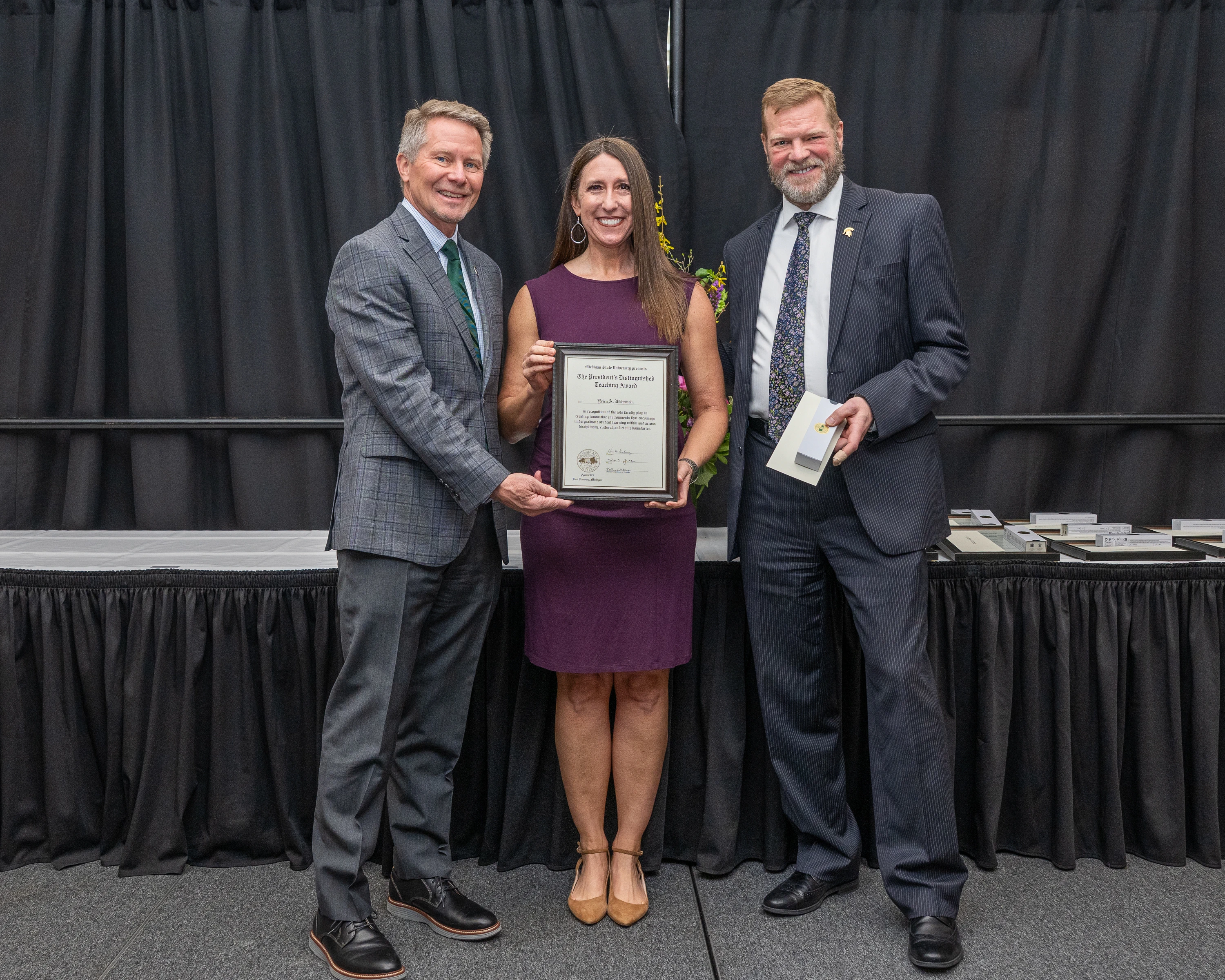 Erica Wehrwein getting the award
