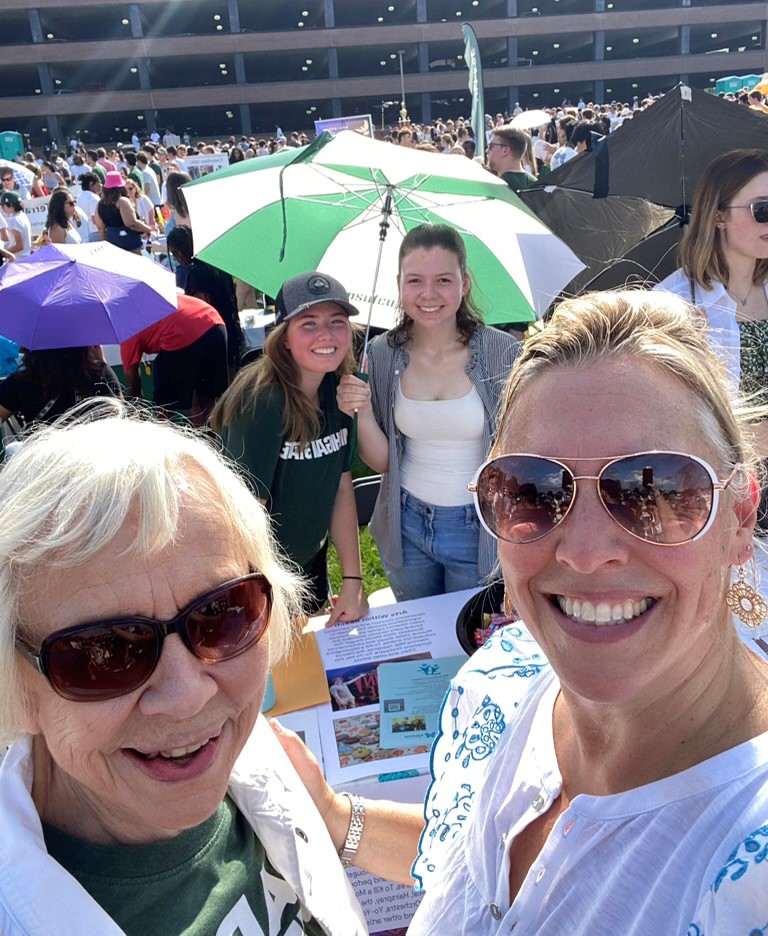 Marcia Van Ness, a member of the East Lansing Seniors Commission along with msu students